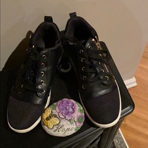 Black Aldo shoes with gold zippers